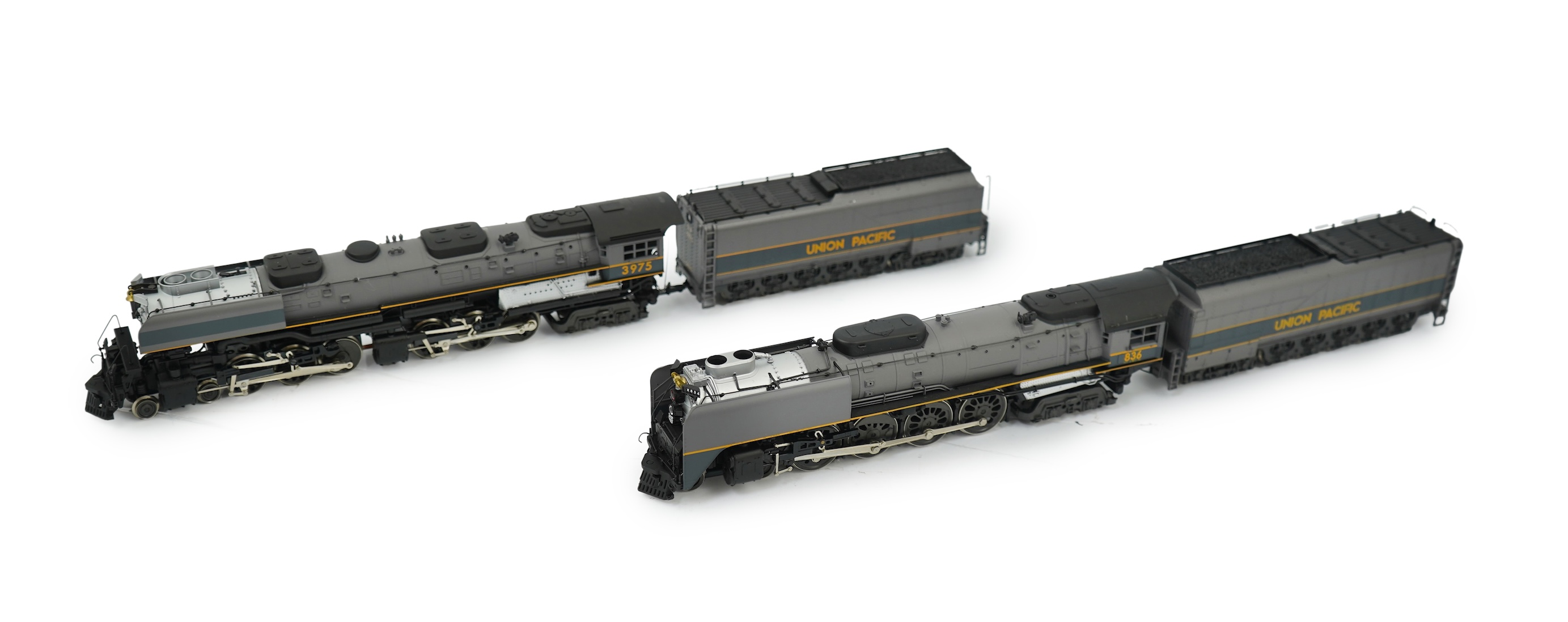 Two HO gauge Rovarossi Union Pacific locomotives; 3975, 4-6-6-4 tender locomotive, together with 836, 4-8-4 tender locomotive, both powered for two rail operation.